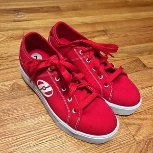 Brand new red HEELYS, never worn